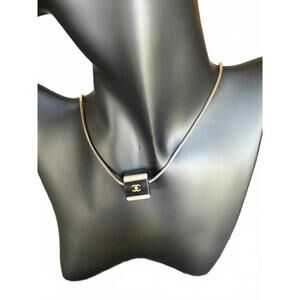 Chanel Gold Tone Necklace with Black Cube Pendant